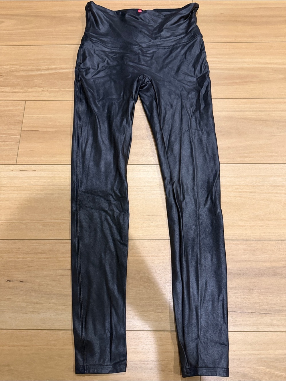 SPANX Black High-Waist leather look leggings.